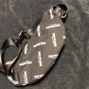 Black and white True Religion Fannie pouch.
